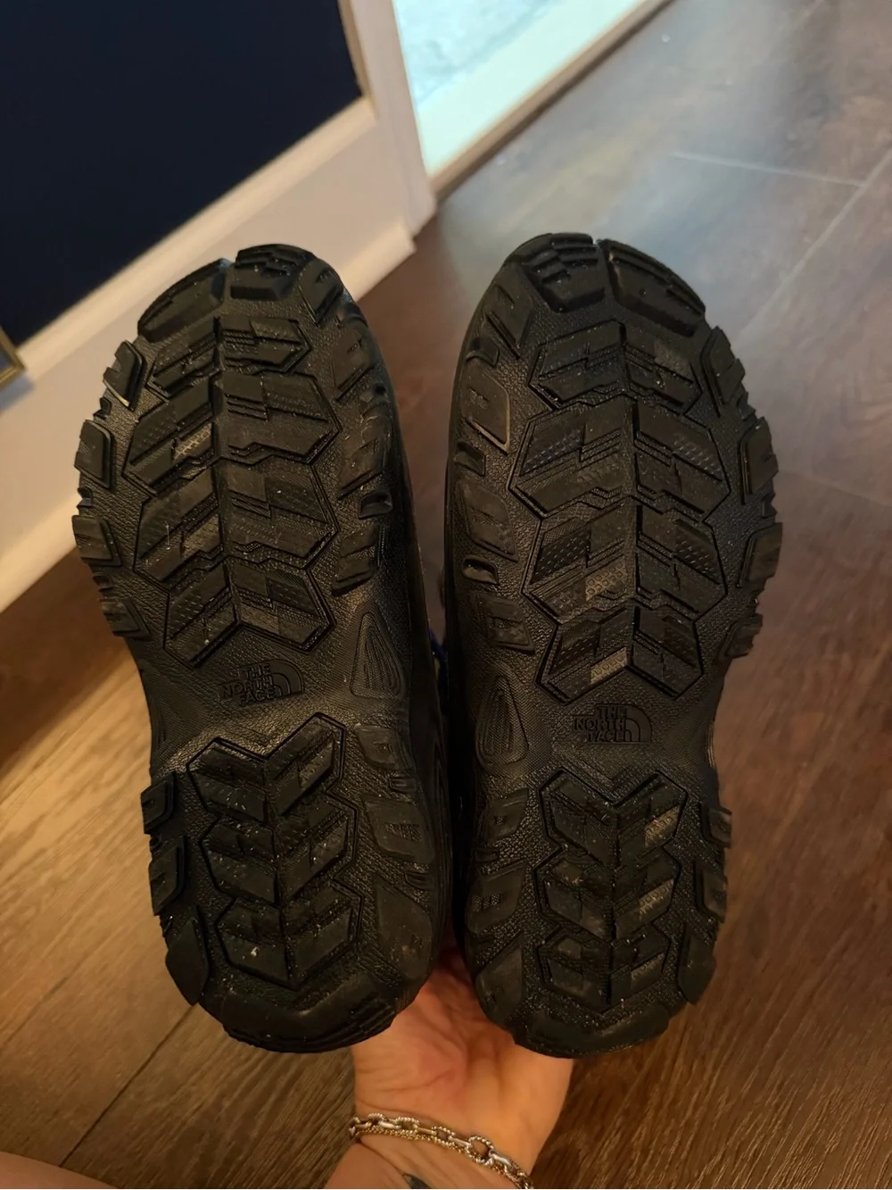 The North Face Kids Brown and Black Waterproof Snow Boots with Blue Laces